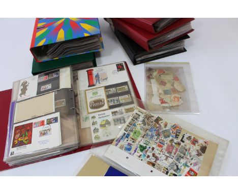 Approximately 350 first day covers and definitive issues contained in six albums and a folder of loose stamps and other posta