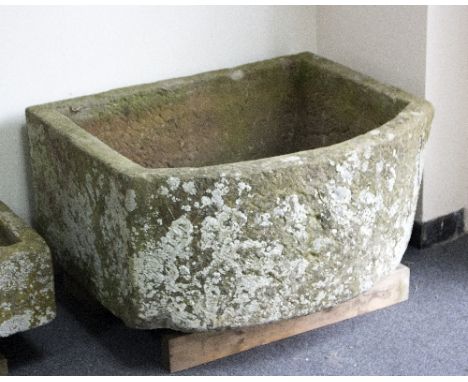 A large 'D' end stone trough, 91cm x 65.5cm