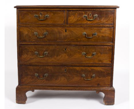 A George III mahogany chest of two short over three long drawers on bracket feet, 83cm wide   Condition Report:  Minor shrink