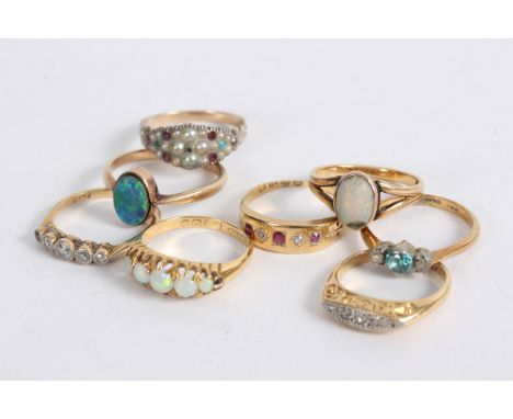 A quantity of gem set rings to include a five-stone diamond ring, a ruby and diamond gypsy ring, an aquamarine and diamond ri