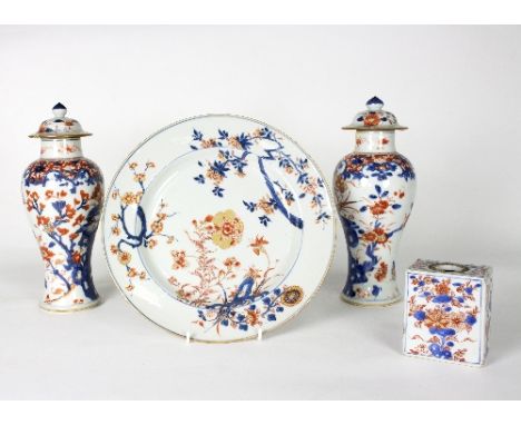 A Chinese Imari plate, Kangxi, decorated prunus branches and flowers, 18cm diameter, a pair of early 18th Century Chinese Ima