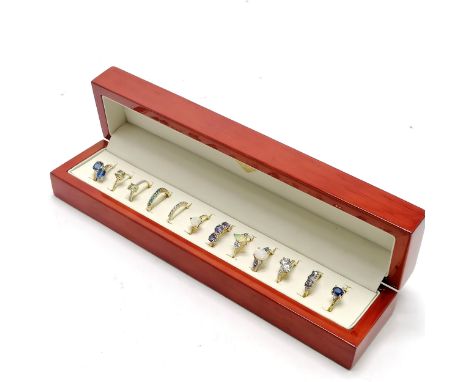 12 x 9ct / 10ct marked gold stone set rings inc opal, tanzanite, diamond, sapphire, topaz etc - total weight (12) 24.2g in a 