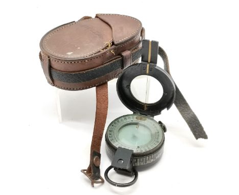 Compass in it's original leather case 6cm diameter 