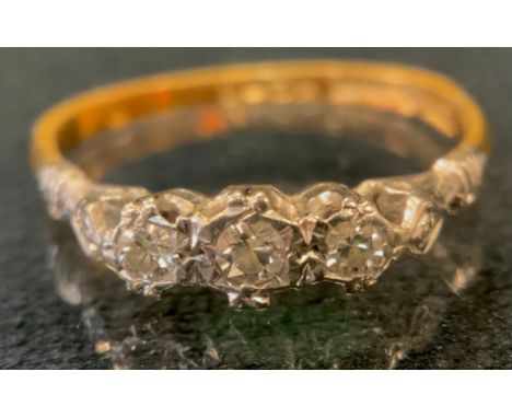 A diamond ring, liner set with three old brilliant cut diamonds, total estimated diamond weight approx 0.20ct, 18ct gold and 