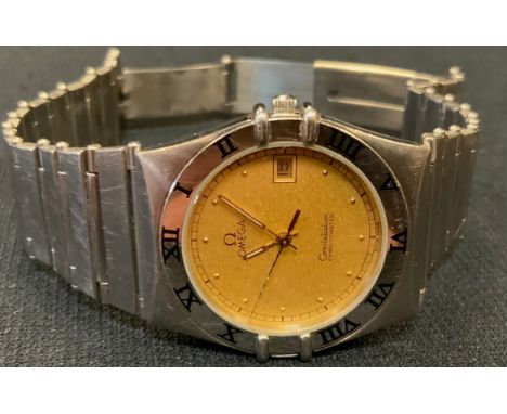 Omega - a Constellation Chronometer quartz wristwatch, 396 1070.1/396 1080.1 gold dial, dot markers, centre seconds, date ape