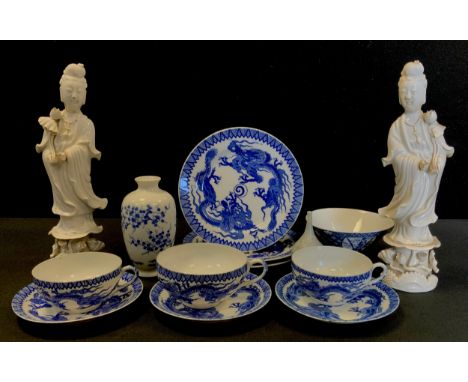 A pair of Blanc de Chine figures, Guanyin;  Nippon Tokusei Sakura blossom vase;  Arita porcelain cups and saucers etc 