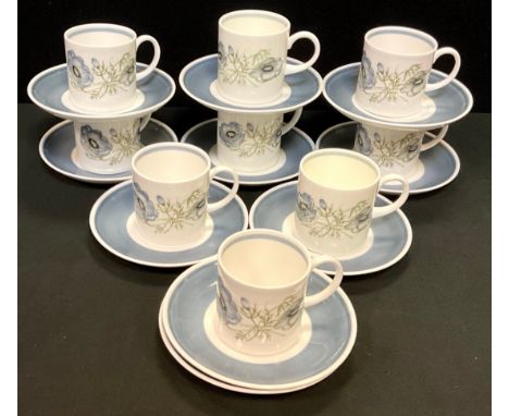 Nine Wedgwood and other Susie Cooper Glen Mist pattern coffee cans and saucers. 