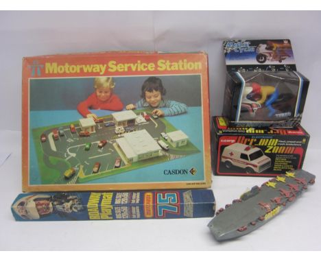 A boxed Corgi L5801 Electronic Flash, Smash and Crash Ambulance, Casdon Motorway Service Station, Matchbox Roadway Playmat an