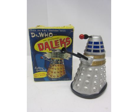 A boxed Louis Marx &amp; Co 1964 Dr Who... The Mysterious Daleks battery operated silver plastic Dalek action figure, complet