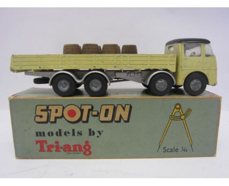 A Triang Spot-On 109/3 diecast model ERF 68G with Flat Float with Sides, light yellow cab with black roof and cream interior,