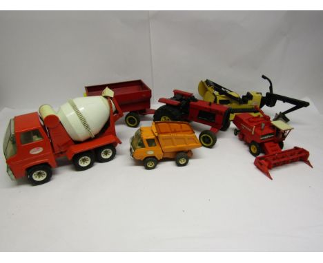 Four Tonka pressed steel vehicles to include tractor with trailer, cement mixer, tipper truck and trencher and a Britains pla
