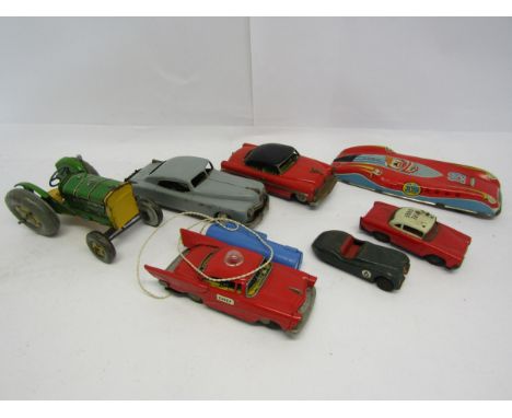 A collection of loose and playworn tinplate toy vehicles, assorted Japanese, German and British examples including Arnold Pri