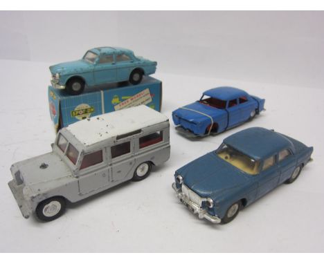 Four playworn Triang Spot-On diecast vehicles to include 216 Volvo 122.S with Sliding Roof in light blue with original card b