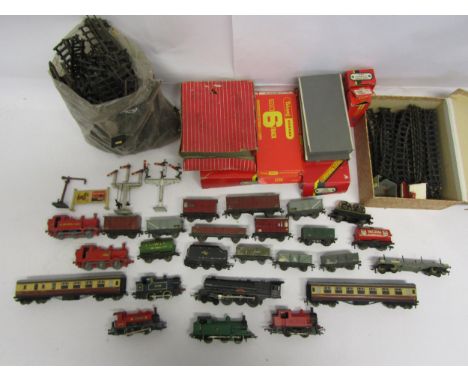 A collection of playworn 00 gauge locomotives, rolling stock, track and accessories including Hornby MR 0-4-0 locomotive 'Rob