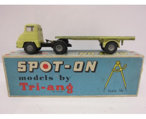 A Triang Spot-On 111A/O.T diecast model Ford Thames Trader with Articulated Flat Float and Log Load, finished in light yellow