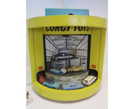 Corgi Toys - An unusual and possibly unique retail or trade fair animated display, featuring sixteen diecast model vehicles, 