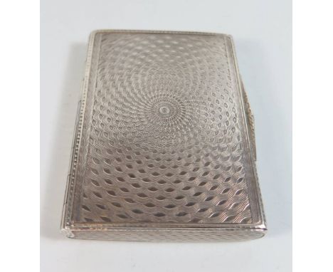 An Imported Silver Cigarette Box with engine turned decoration, 102g