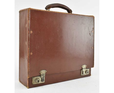 A cased collection of early 20th century 1920s mounted photographs presented in a contemporary calf briefcase. The photograph