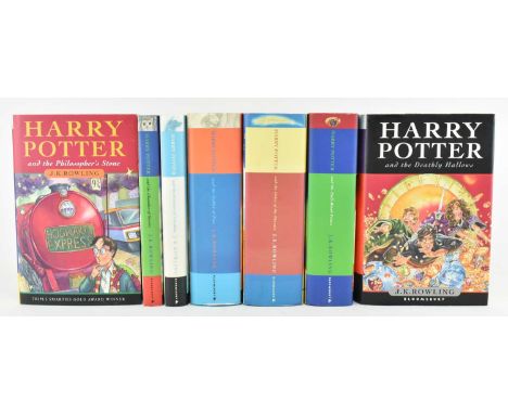 Rowling, J. K. A complete set of all seven Harry Potter novels, some later impressions, some first editions, all hardbacks in