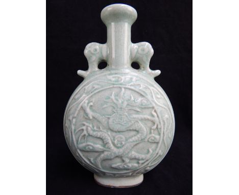 Chinese celadon green moon flask, elephant head handles, relief decorated dragon and bird of paradise, symbol and figure reli