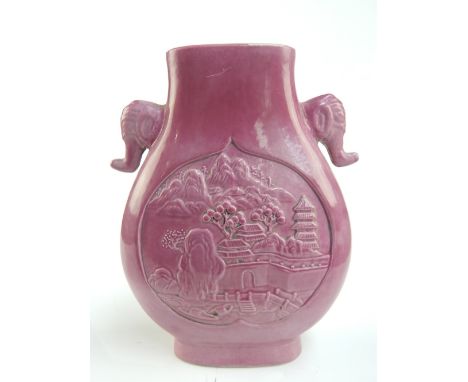 Chinese pink glaze moon flask, elephant head handles, relief carved landscape panels, character stamps to base, 15 x 12cm w