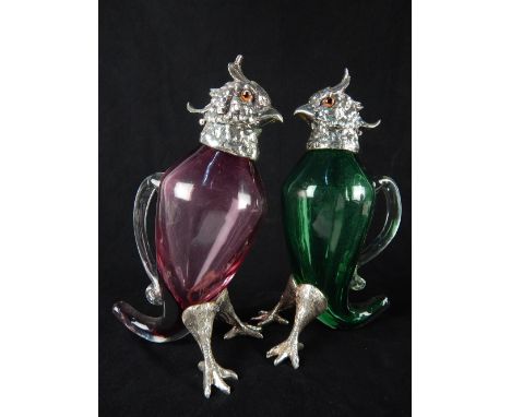 Ruby glass and silver plate mounted decanter, modelled in the form of a parrot, 27cm h, together with another similar with a 