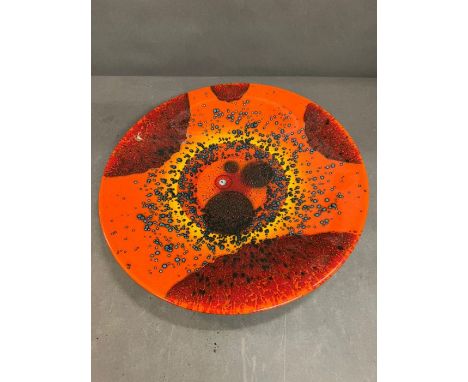 A Charger by Poole pottery  