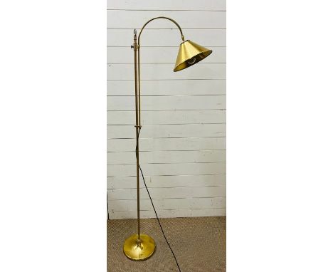 A brass standard lamp, cone shape and adjustable height 