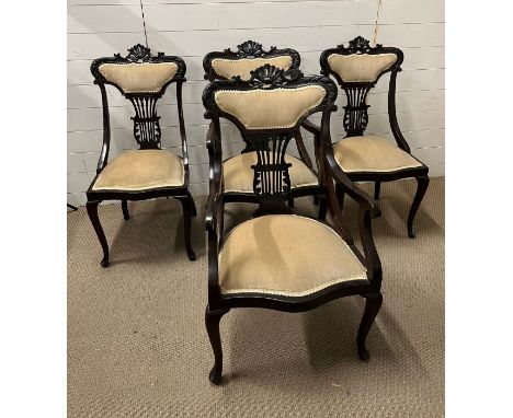 Four Edwardian chairs with harp back and pad feet 