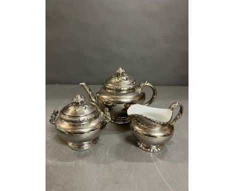 A Royal Worcester silver lustre teapot, sugar bowl and milk jug 