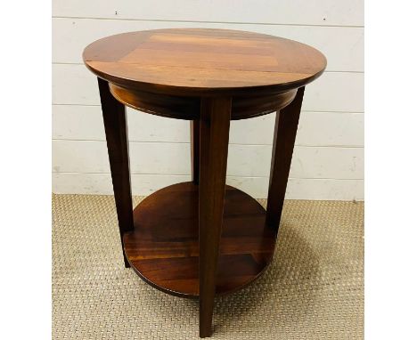 A circular side table with four supporting legs and shelf under (H60cm Dia45cm)