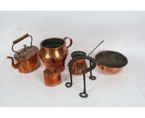 Collection of 19th century copper, to include a kettle, jug, side pouring jug, tea caddy, bowl/cover, and an iron horse shoe 