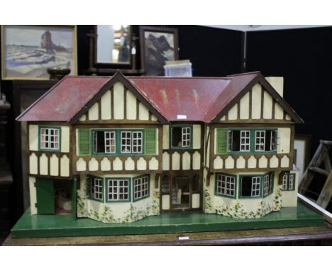 Vintage large Tri-ang dolls house, with a collection of furniture and accessories, the house 121.5cm long