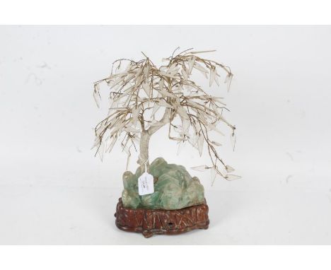 Chinese table lamp, in the form of a tree, with green hardstone base and hardwood plinth, with glass leaves, 40cm tall approx