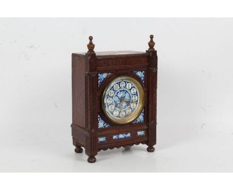 Early 20th century oak and porcelain mantle clock, the blue and white porcelain dial with arabic numerals, twin train movemen