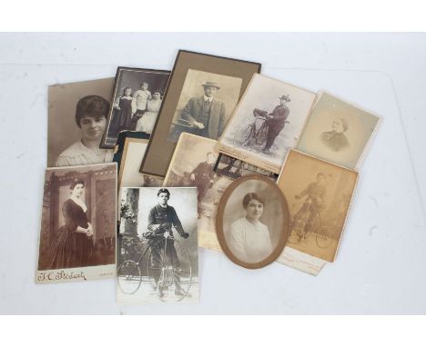 Collection of late Victorian and early 20th century photographs, mostly portrait, including a boy with a penny farthing (qty)