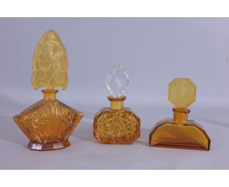 - Amber willowy nude dances with scarves. Item #368 - Amber colored molded glass with clear glass stopper and etched cherib. 