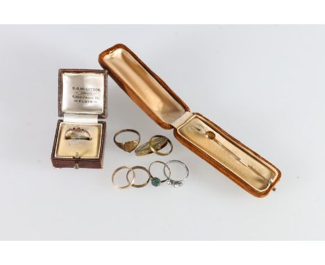 15ct gold dress ring set 1.9g, an unhallmarked yellow metal dress ring 1.8g, five other rings, a clip and a stick pin. 