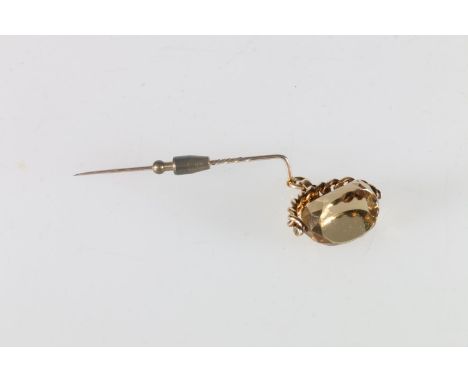 15ct gold stick pin with gold faceted citrine swivel fob 15g gross. 