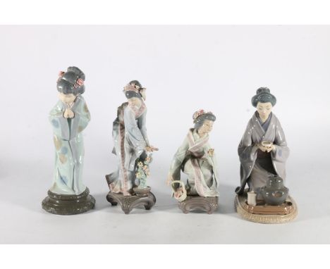 Four Lladro Spanish porcelain figurines to include 5122 Geisha drinking tea, 4989 Geisha with clasped hands, and two others w