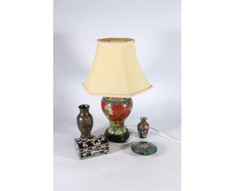 Oriental cloisonné enamel dome topped casket, a powder jar and cover, a miniature baluster vase, a Chinese baluster table lam