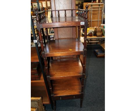 Victorian mahogany four shelf gallery backed etagere with single base drawer and brass castors, 143cm high. Scratching throug