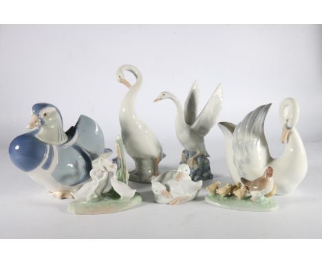 Seven Nao by Lladro of Spain porcelain models to include swans, large duck, hen and chicks group etc. (7) 