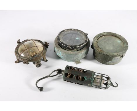 Two ships compasses, a inspection lantern and an electric lamp. (4) 