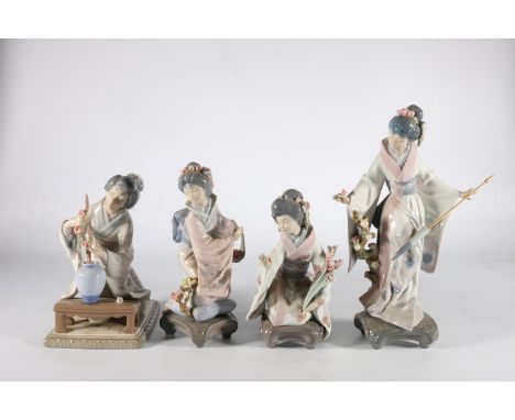 Four Lladro Spanish porcelain figurines to include Geisha with parasol and flowers, Geisha with vase and tree, Geisha with ba