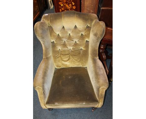 Victorian mahogany button-back wing armchairs. 