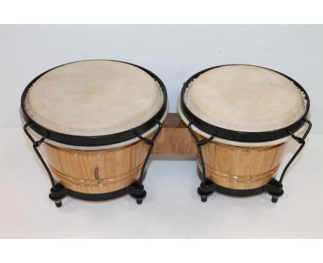 Pair of bongo drums. 