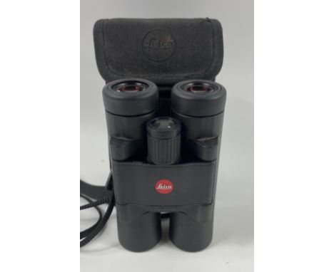 A pair of LEICA Ultravid 10x25 Compact BINOCULARS in their case