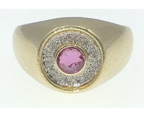 585 stamped gents FABULOUS large ruby(4mm diameter) centred with diamond chips(tested) surrounding the ruby - size W gross we