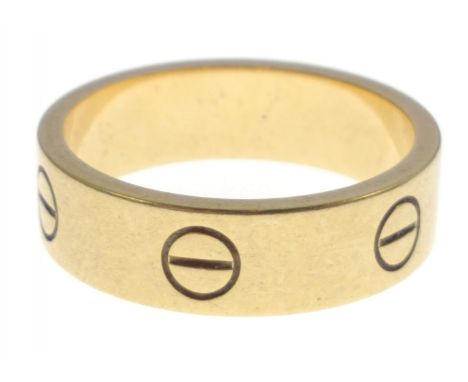 IMPRESSIVE CARTIER 750 stamped yellow gold RING size Q, weight 8.20g - Cartier's LOVE collection is undeniably elegant. Stamp